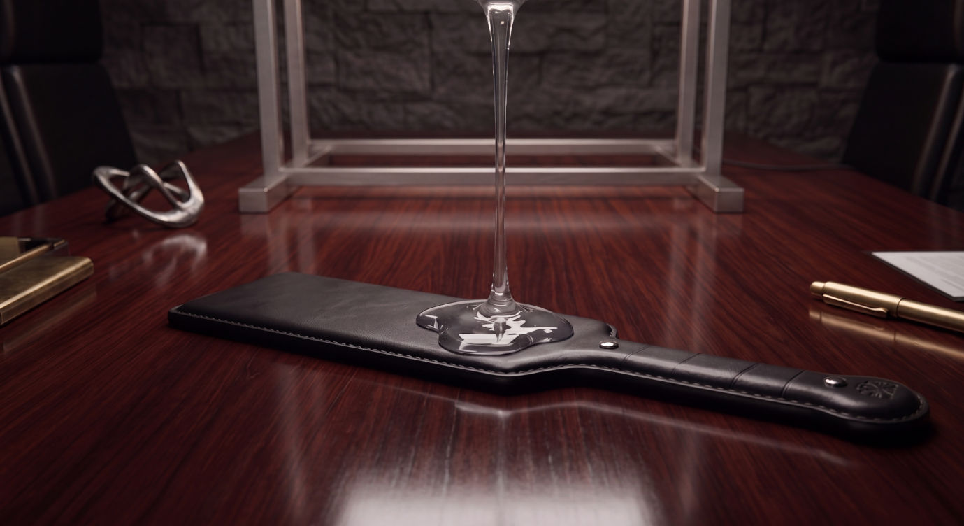 Dark tabletop scene with a paddle and viscous lubricant